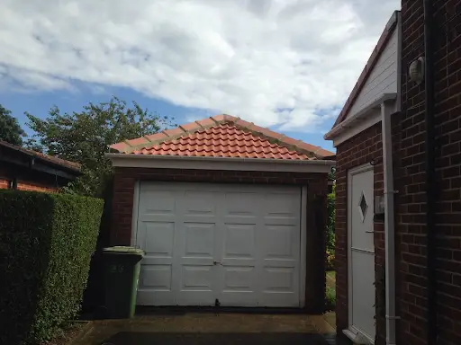 Stage 4 (After): Flat-to-pitched timber structural garage roof conversion tiling finished cleanly