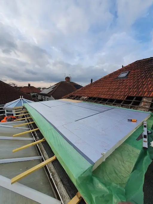 Insulation boards fitted for a warm roof