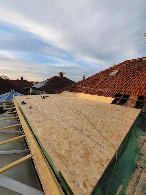 New deck boards fixed over the insulation