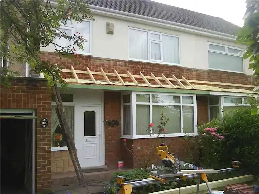 Stage 1 (Before): Structural timber rafters engineered to create roof profile