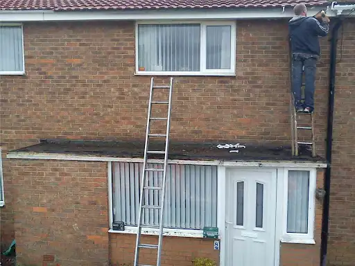 Old front canopy roof being stripped