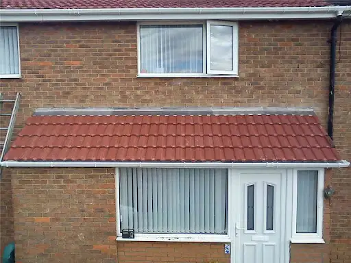 Front canopy re-tiled with new red tiles