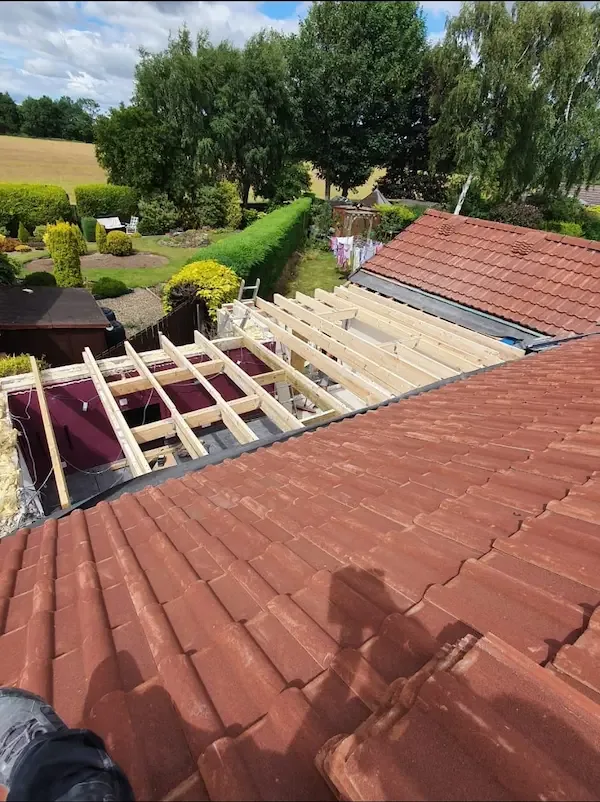 New timber joists going in for the warm flat roof