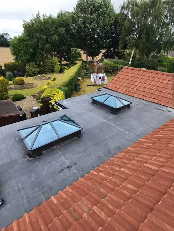 Finished EPDM flat roof with two roof lanterns