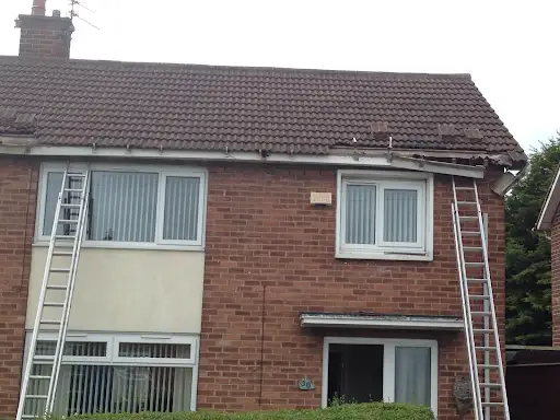 Stage 1 (Before): Damaged, weathered slate roof tiles over an old residential extension