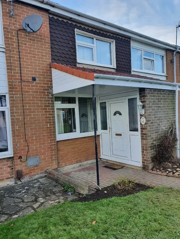 Finished front canopy with new tiles, soffit and guttering